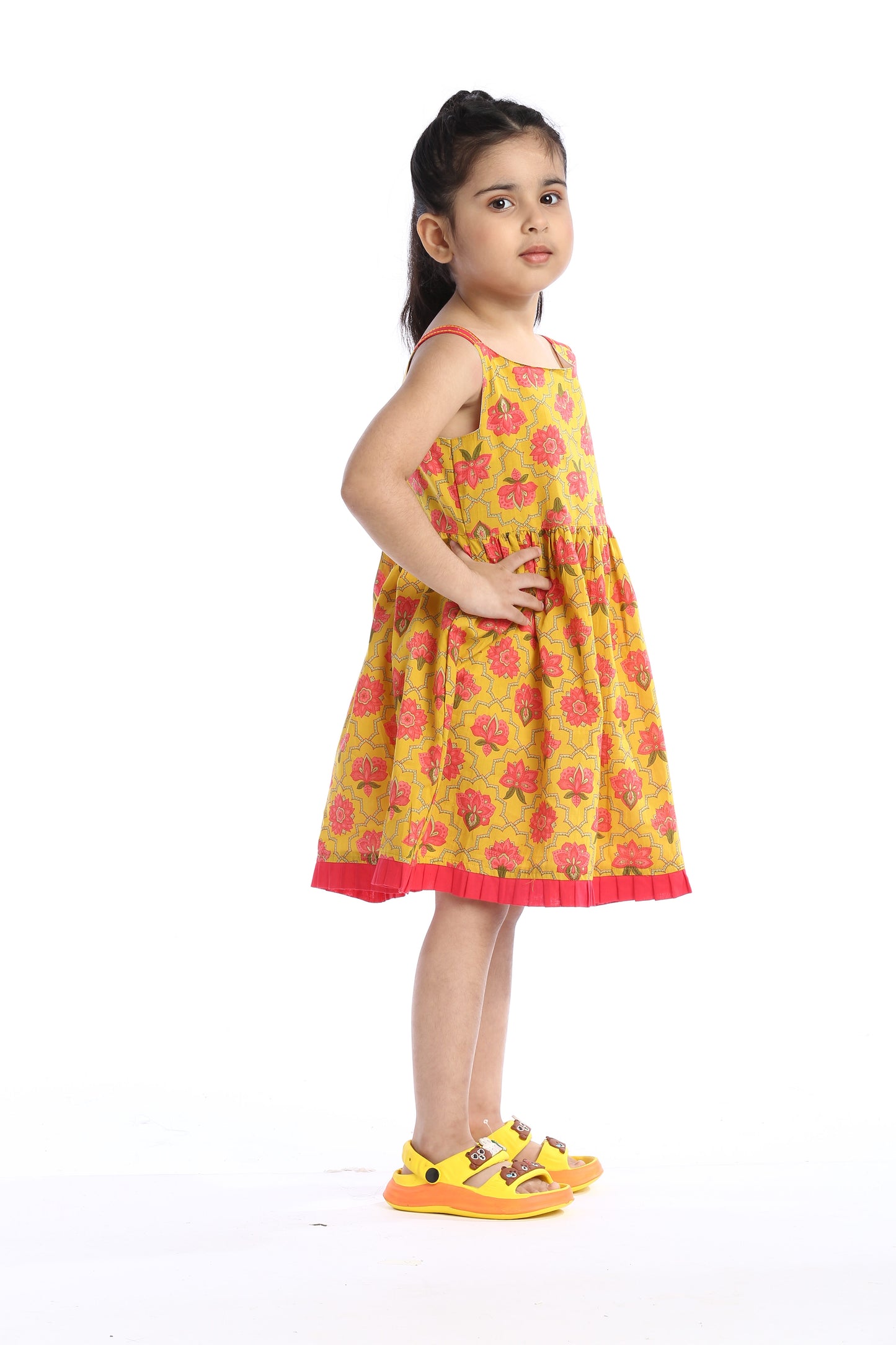 Bright Floral Sleeveless Girls' Frock in Yellow