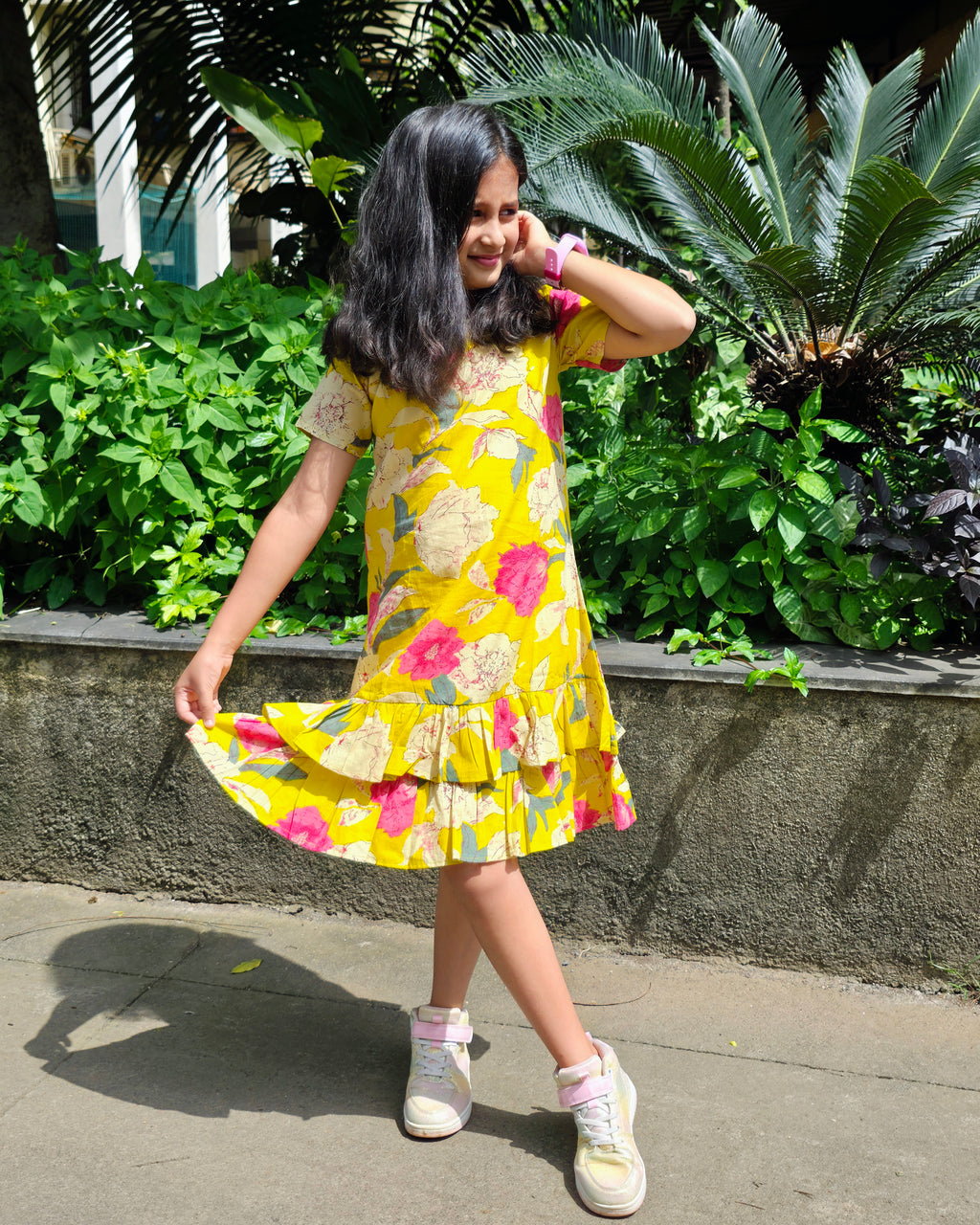 The ek'dor Sunshine Hibiscus Ruffle Dress